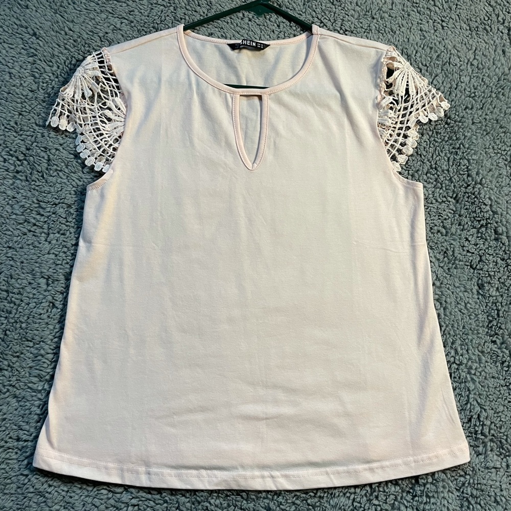 Pink top with lace sleeves